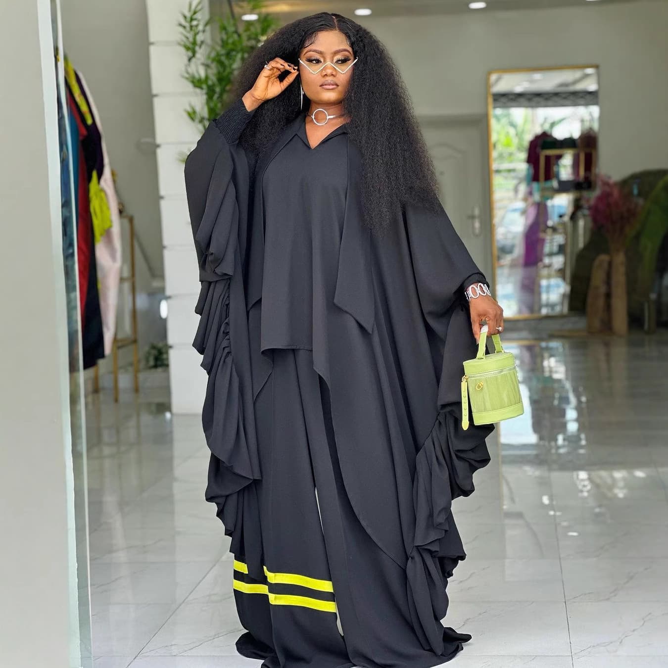African-style loose-fitting, elegant batwing sleeve asymmetrical top and color-blocked striped wide-leg pants two-piece set