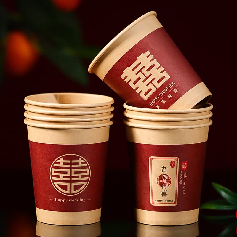 Disposable wedding paper cups with red double happiness design, ideal for engagement parties, toasting, and comprehensive wedding supplies.