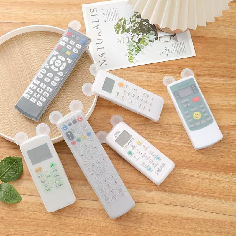 Bear-shaped transparent silicone remote control cover with glow-in-the-dark feature for air conditioners and TVs.