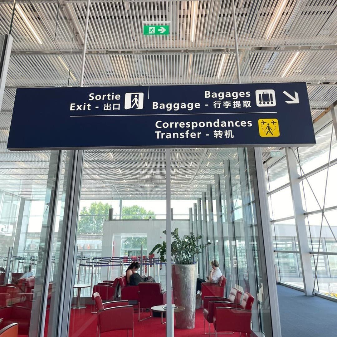 Custom-made signs and light boxes for train stations, airports, subways, and underground parking garages; double-sided hanging signs.