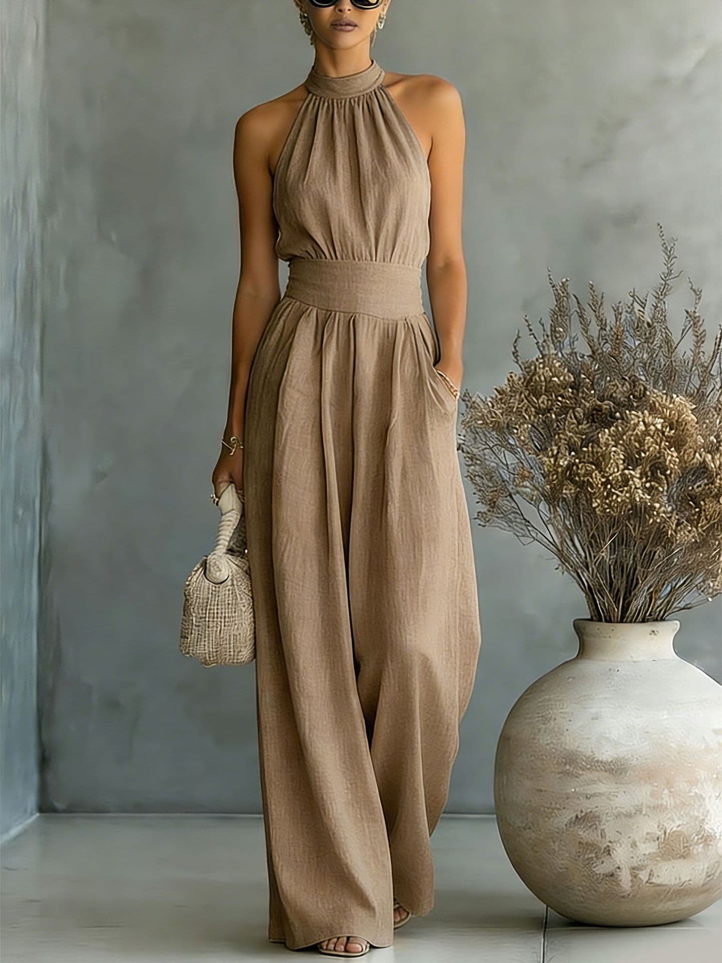 2026 New Popular Sleeveless Halter Neck Jumpsuit with Loose Wide-Leg Design and Elegant Waist-Cinching Style