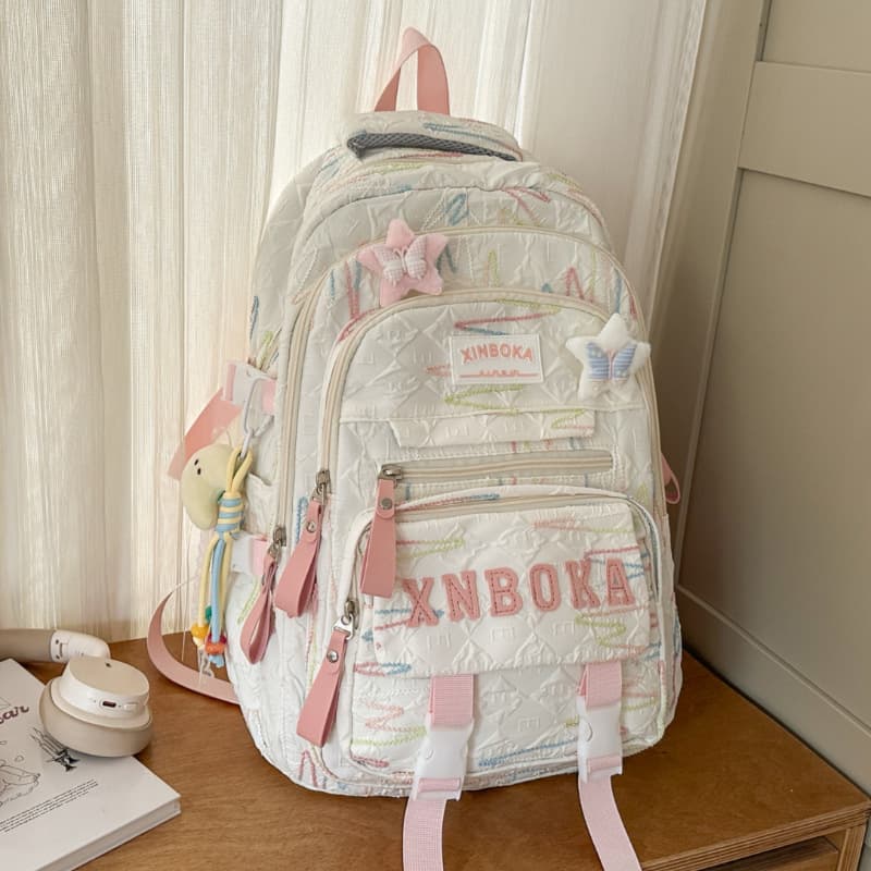 Schoolbags for primary school students in grades three to six, large-capacity ins girls, middle school students, burden-reducing backpack, junior high school students' backpack