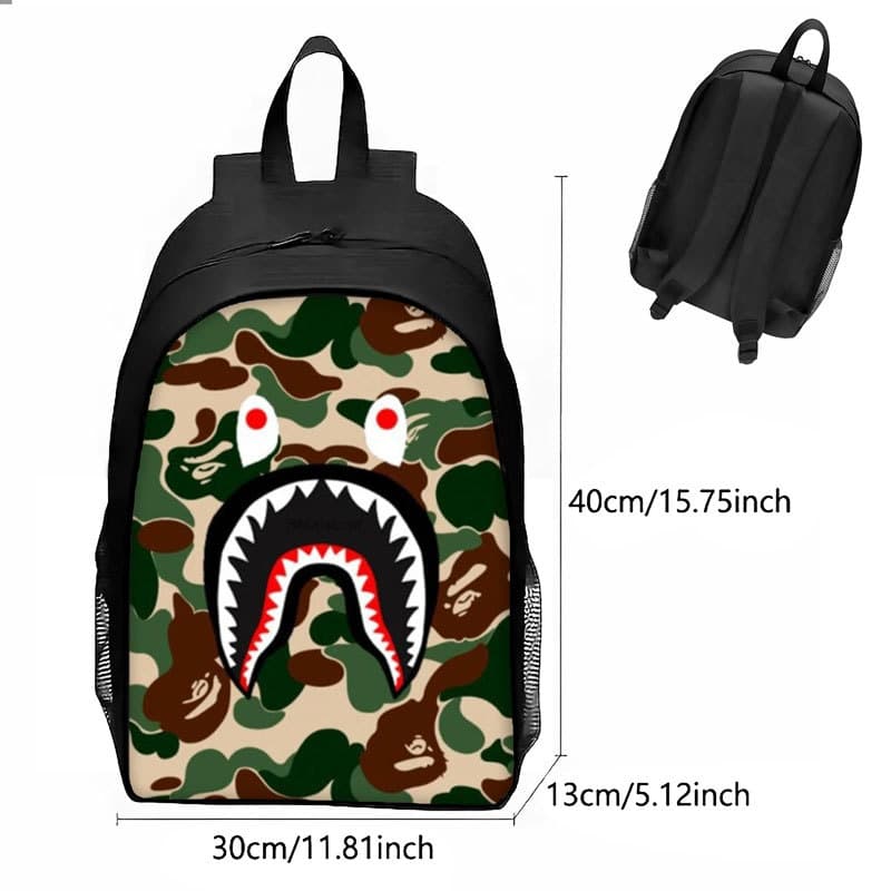 Cross-border New Printed Big Mouth Graffiti Backpack Camouflage Shark Versatile Double Shoulder Schoolbag for Elementary School Grades 1-4