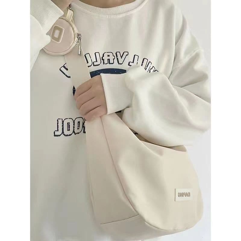 Nylon Waterproof Canvas Dumpling Bag Student Large Capacity Shoulder Bag Korean Style Versatile Simple Crossbody Bag Trendy