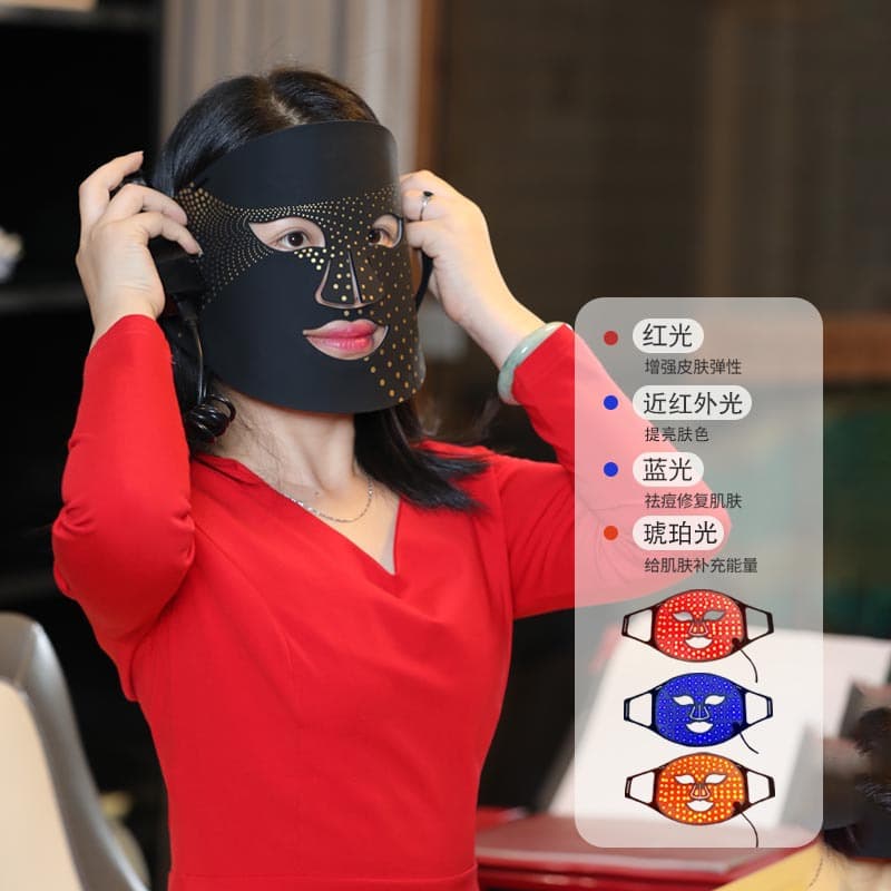 Home-use four-color light reverse light beauty device multi-functional whitening and rejuvenation near-infrared photon skin rejuvenation beauty mask.
