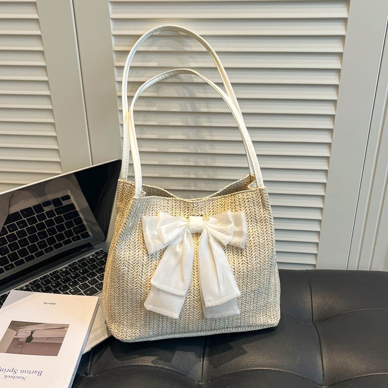Summer Chic Woven Straw Underarm Bag for Women 2026 New Gentle Elegant Bow Bucket Bag Versatile Shoulder Bag