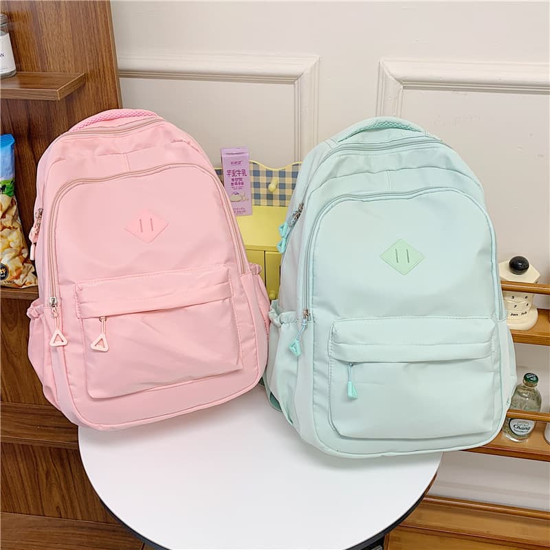 New solid color backpack, large capacity, middle and high school student school bag, light and sweet travel backpack, casual computer bag