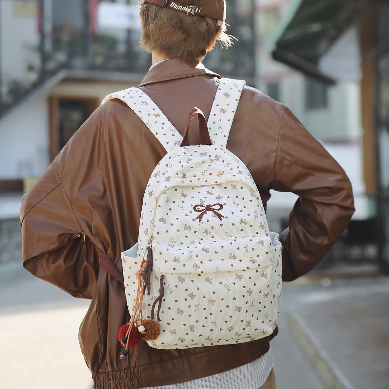 Cross-border corduroy backpack for women, high-appearance bow middle school student backpack, Korean-style corduroy lightweight commuter schoolbag
