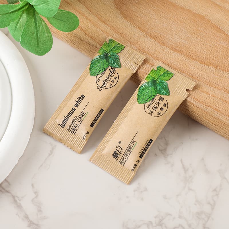 Disposable kraft paper bag 3g toothpaste, travel portable B&B hotel disposable small toothpaste, English small toothpaste
