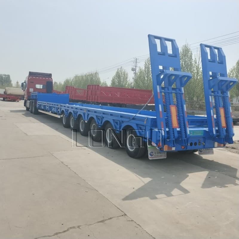 Factory-direct large machinery transport semi-trailers, excavator transport trailers, and engineering heavy-duty transport flatbed semi-trailers.