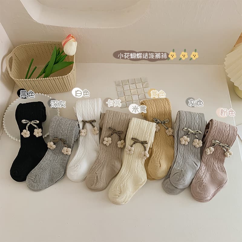 Cross-border baby girl pantyhose spring and autumn versatile outer wear knitted twist small flower bow children's leggings