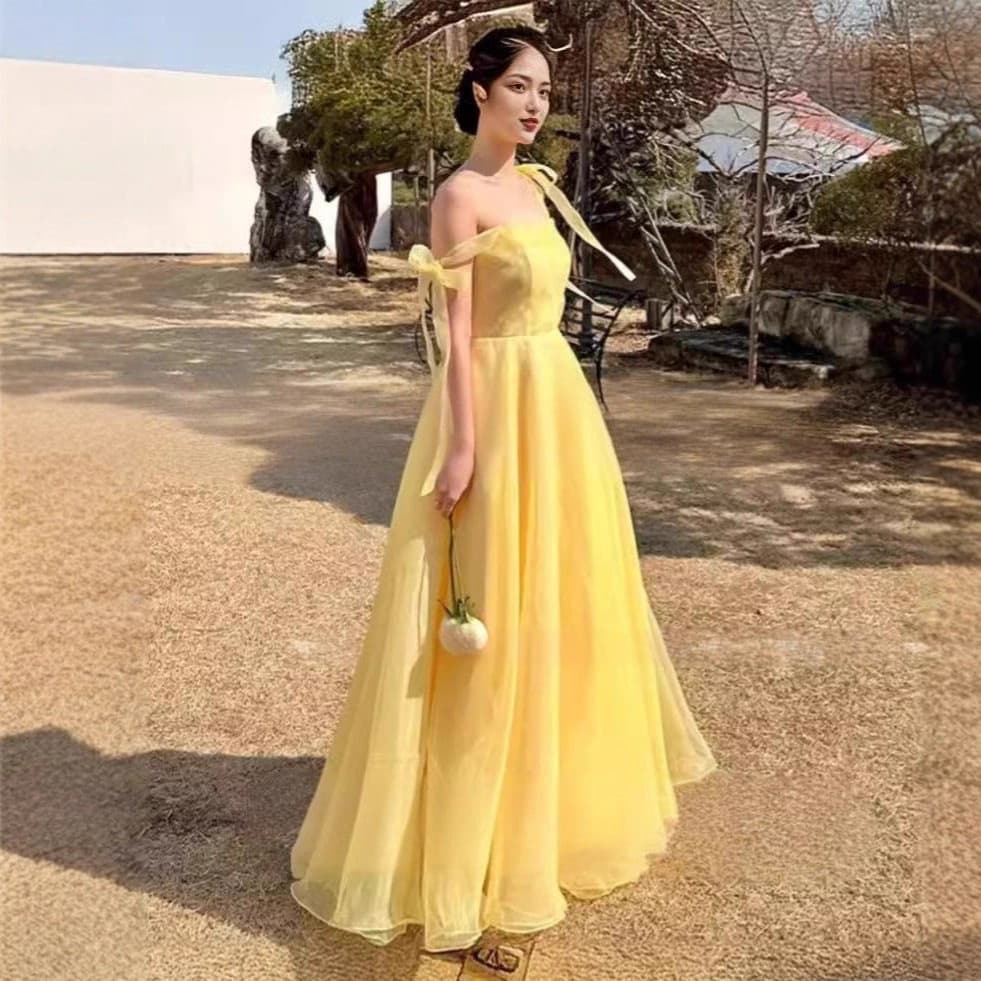 Cross-border wholesale yellow strappy Korean-style evening dress, simple and elegant, suitable for daily wear with a high-end feel
