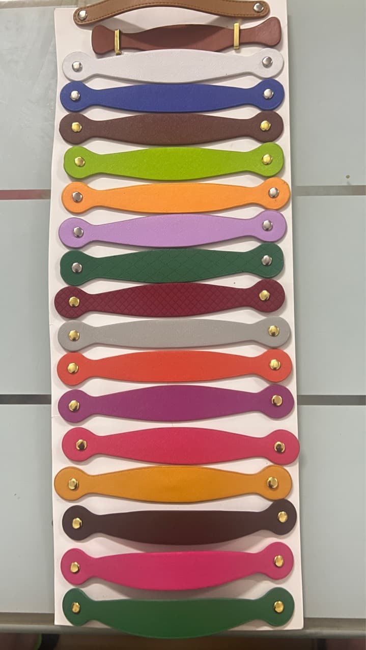Manufacturer's holiday gift boxes with PU leather handles, PU carrying straps, leather handles, and leather pull tabs.
