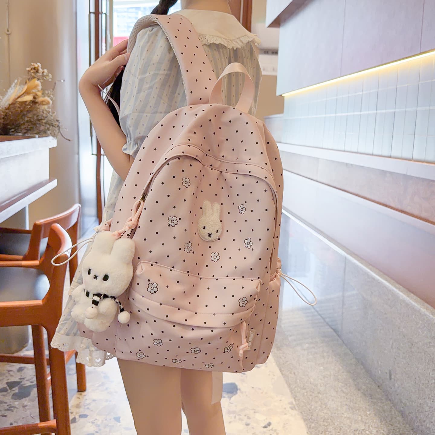 New school bag female ins niche high-looking little star backpack primary school student Korean large capacity junior high school bag