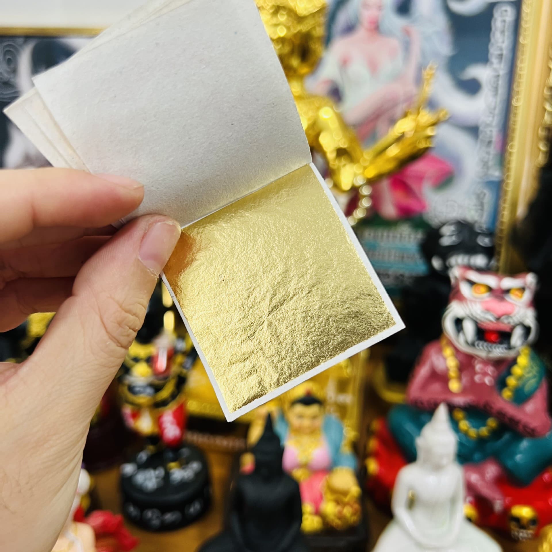 Thailand's authentic handicrafts, gold foil paper, gold foil stickers, painting, gold decoration with Buddha statues