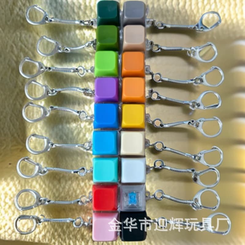 Unzip merit colorful buttons fun toys snake bone chain colorful macaron cubes mobile phone chain keychain wholesale
