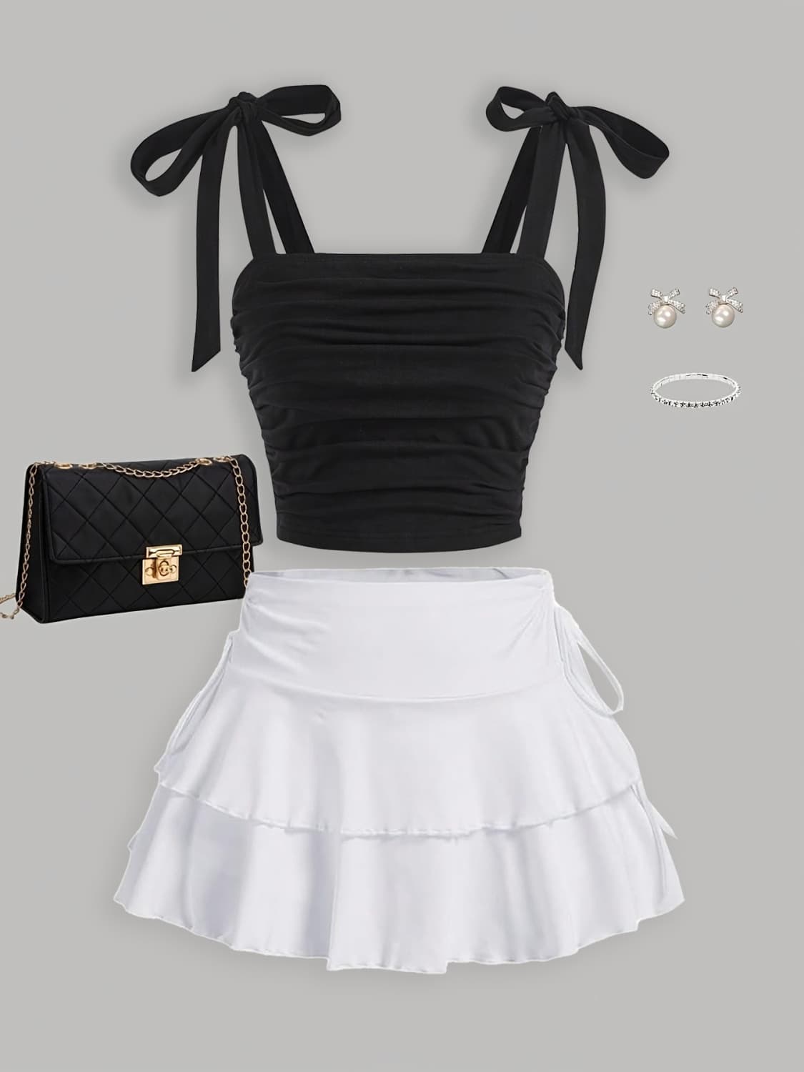 Spring and Summer New Fashion Bow-Tie Strap Top + Women's Multi-Layered Energetic and Sexy Short Skirt