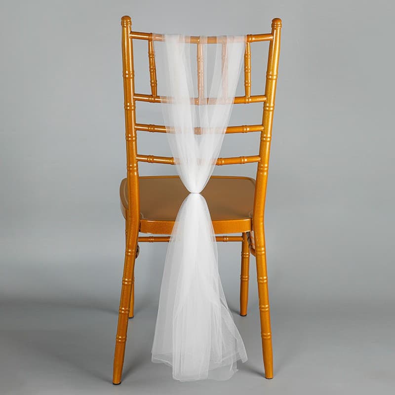 Custom cross-border wedding long outdoor banquet chair back decorations: tulle flowers paired with light gauze for Western-style banquet setup.