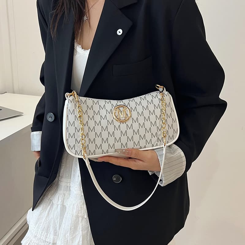 This year’s fashionable 2025 new niche underarm bag, western style shoulder bag, letter printed crossbody bag, crescent moon bag