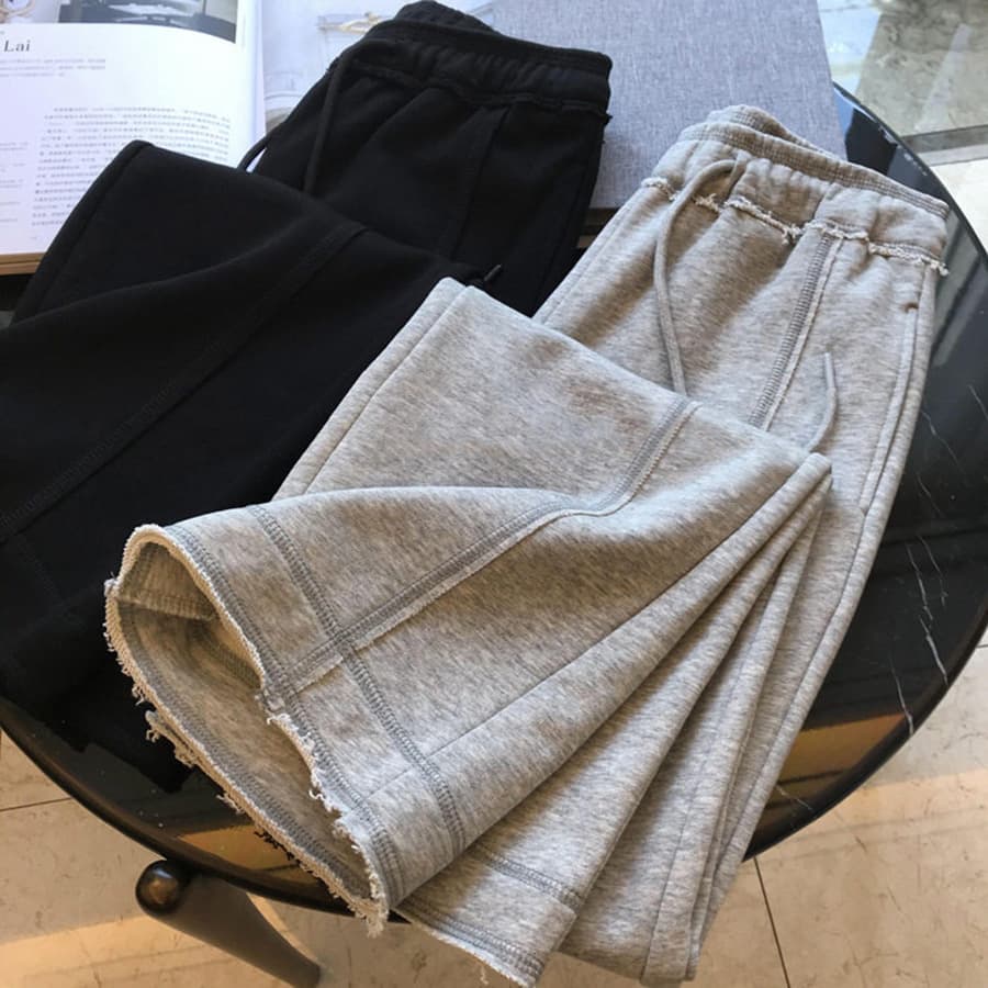 Designer style! Super slimming high-waisted drawstring wide-leg casual sweatpants for women with frayed edges.