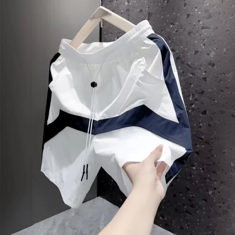 New summer color-blocked shorts for men, trendy, fashionable, loose-fitting, casual, five-point pants, versatile, Korean style.