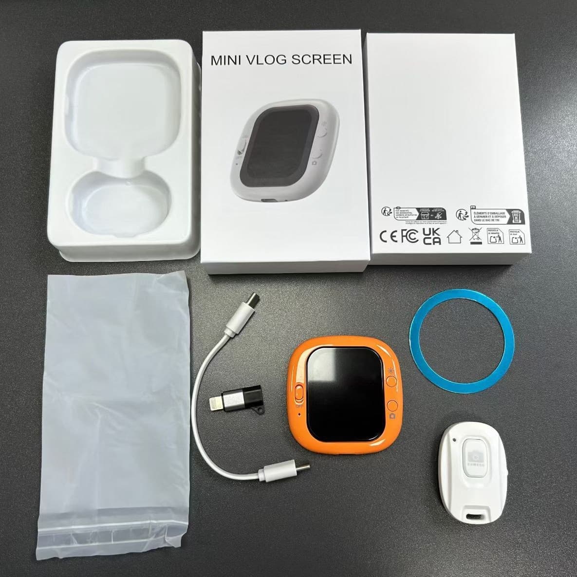 X40B mobile phone screen mirroring device with magnetic rear camera selfie display, popular for live streaming and selfies.