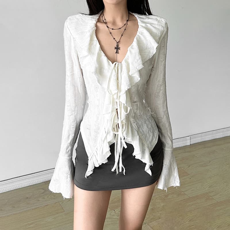 Cross-border European and American style 2024 Amazon autumn new women's solid color sexy long-sleeved V-neck knitted fringed jacket