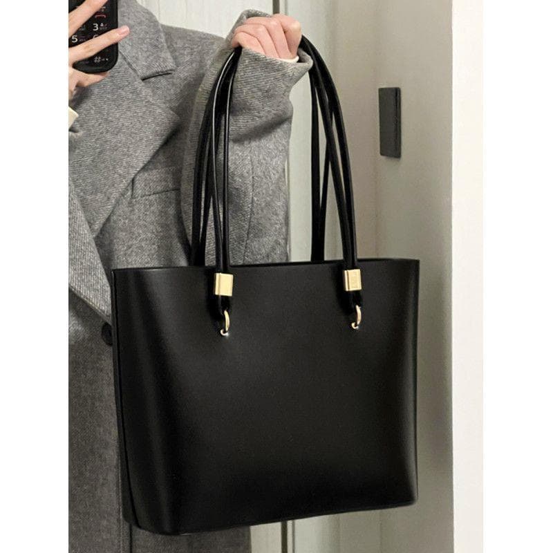 Extraordinary women's bag 2025 new fashion niche high-end casual fashion commuting to class large capacity shoulder tote bag
