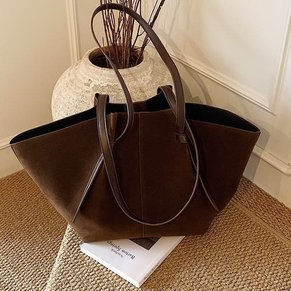 Cross-border new YUZEFI tote bag niche design simple hollow women's bag commuting texture women's beach shoulder