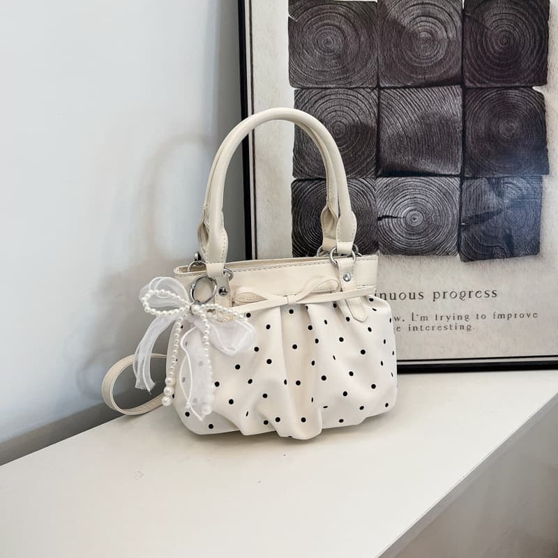 Korean style high-looking polka dot portable pleated bag for women 2026 new style versatile and stylish commuting travel single shoulder crossbody bag