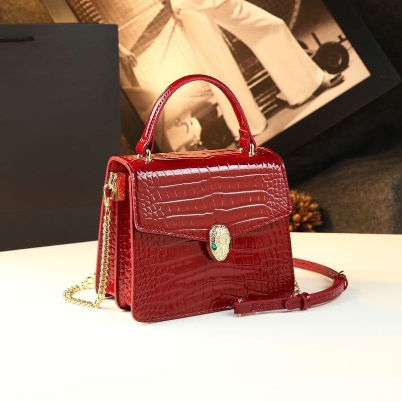 2026 new brand small square bag hand-held crossbody bag fashionable and exquisite glossy patent leather crocodile pattern snake head bag for women