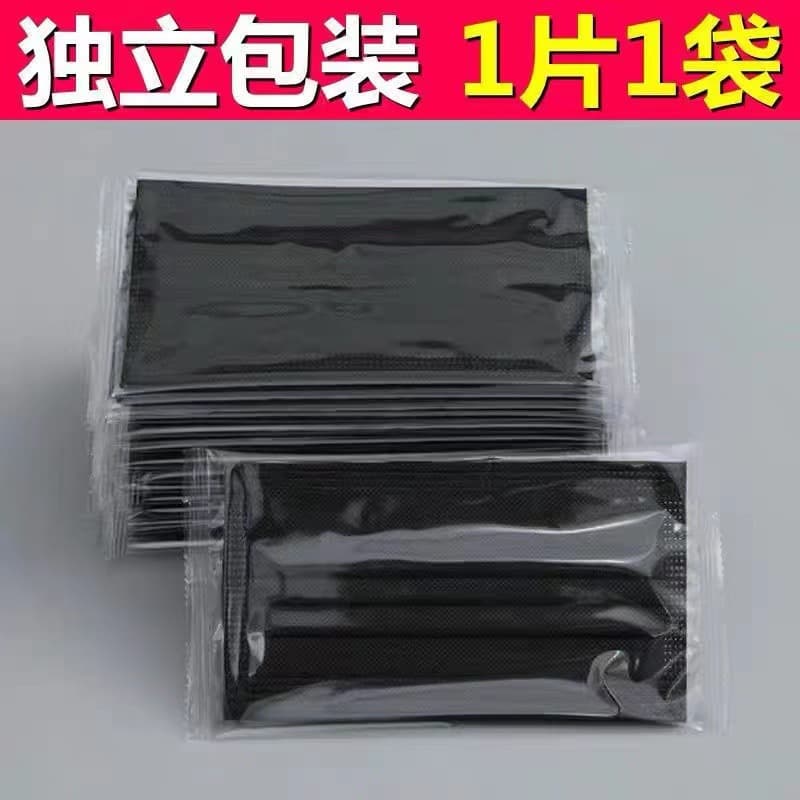 Black individually packaged disposable three-layer face mask with meltblown fabric, adult protective, dustproof, breathable, available for wholesale.
