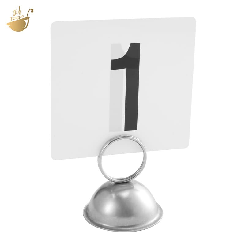 Stainless steel table number cards, place cards, and menu holders for hotels, restaurants, and weddings.