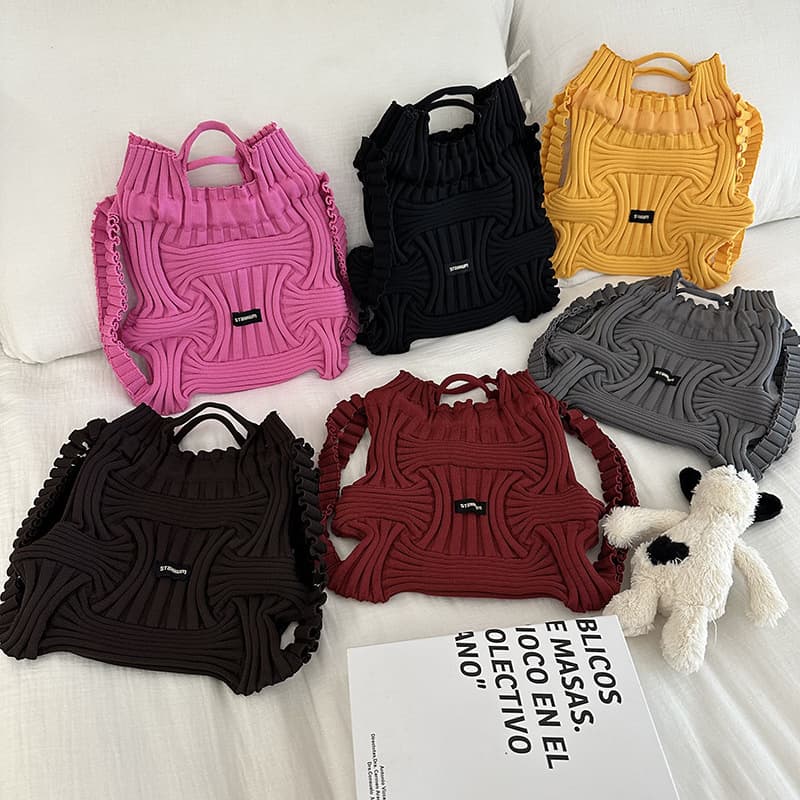South Korea's Dongdaemun personalized niche design casual backpack women's knitted woven handbag dual-hand trend
