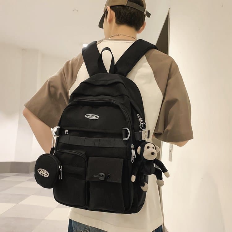 Wholesale new casual backpack, fashionable Japanese large-capacity bag, female couple high school, junior high school and elementary school bag