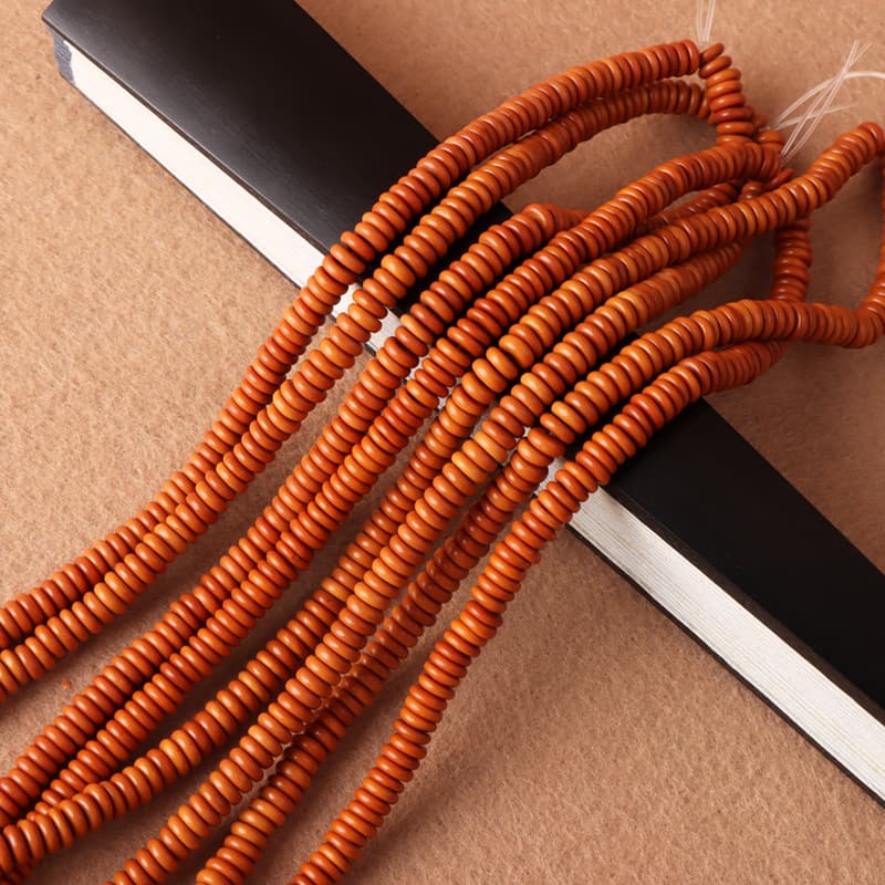 Wholesale olive pit round-edged spacers, long strips of plain beads, DIY accessories, men's and women's collectible handmade spacers, loose beads, approximately 216 pieces.