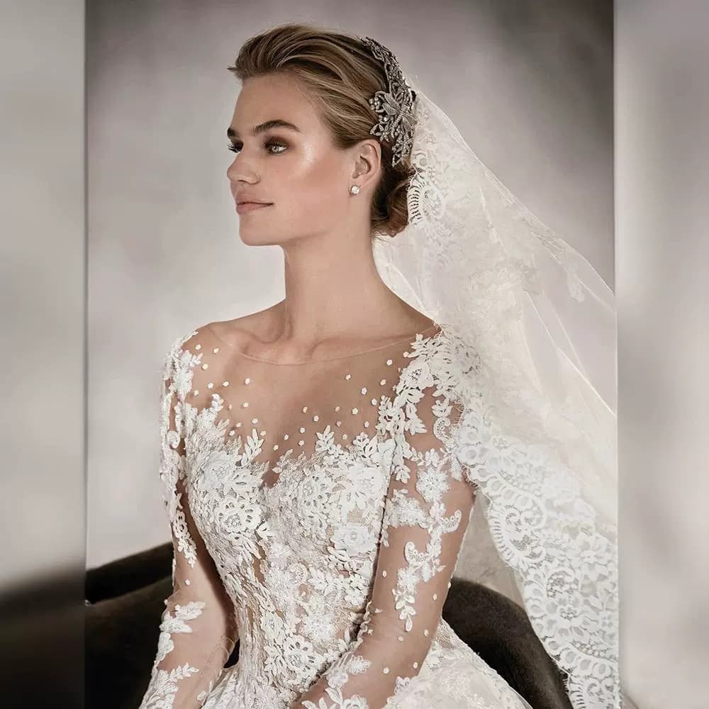 Long Sleeve Wedding Dress 2025 New Style Princess Puffy Skirt European and American Retro Lace Slim Fit Nude Color Cross-Border Train