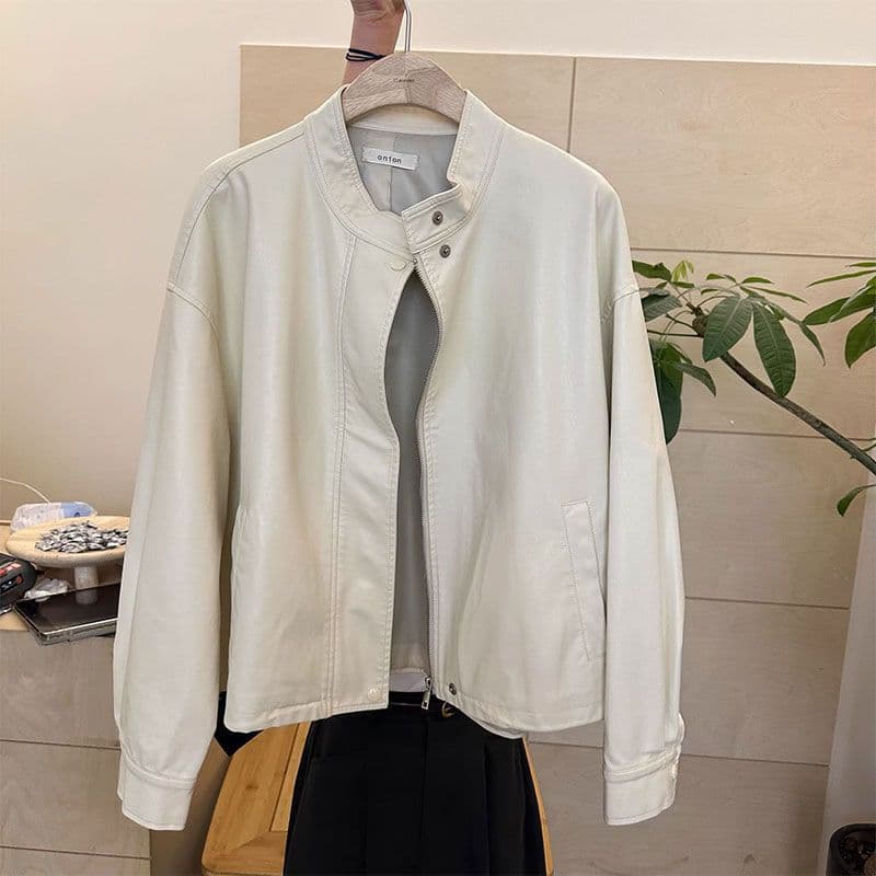 Plus-size women's stand-up collar loose short jacket, fashionable and versatile PU leather jacket for autumn 2025.