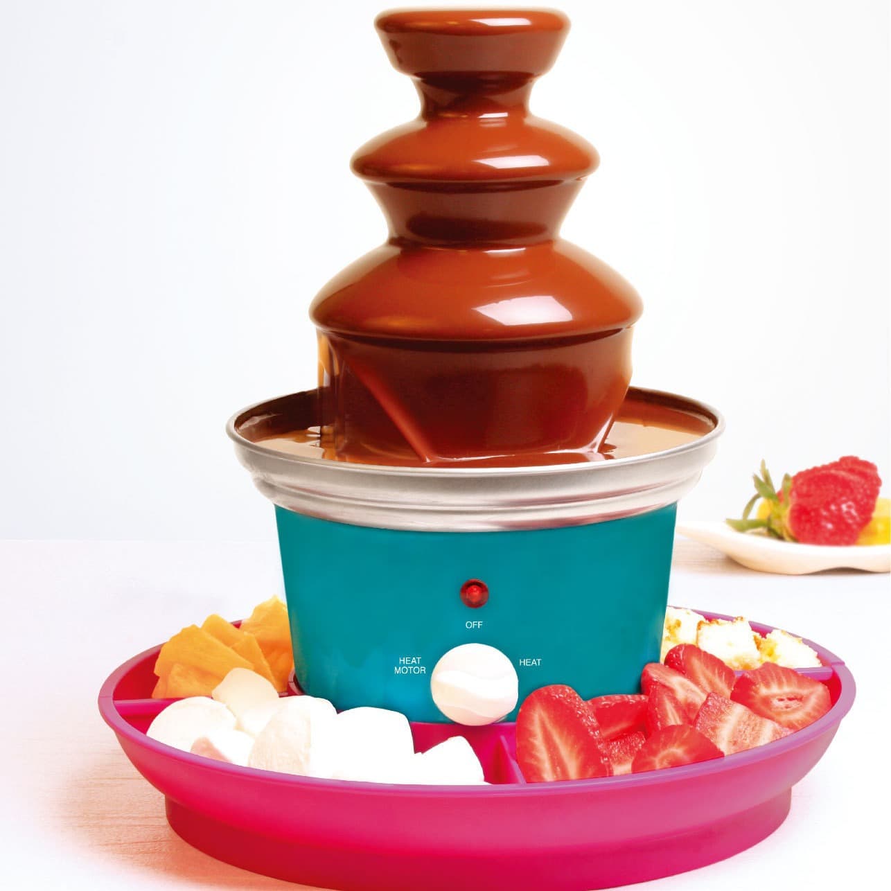Chocolate mixer with fruit platter, three-tiered stainless steel fountain