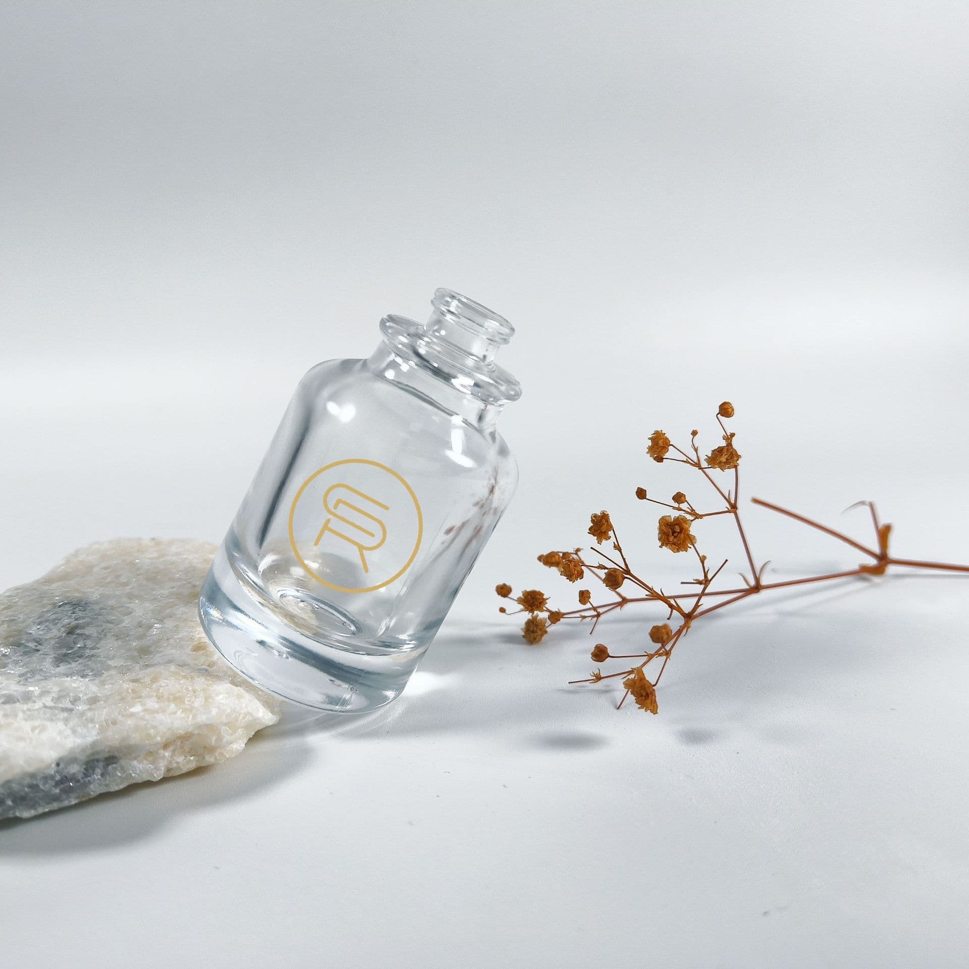 30ml round-shoulder cylindrical perfume bottle with snap-fit design, available in stock.