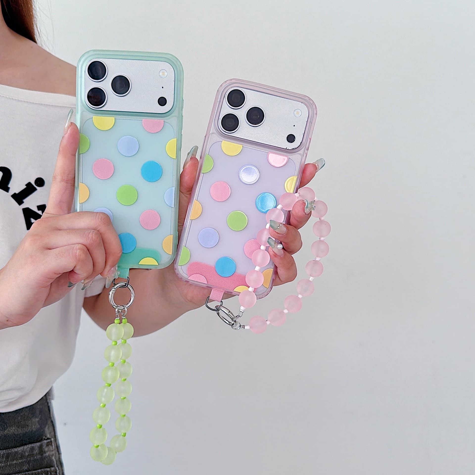 Summer polka dot suitable for Apple 17pro mobile phone case 18promax translucent color polka dot shell 16 chain shell 15