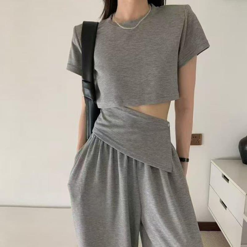 Summer fashionable waistless hot girl fashion suit irregular fake two-piece top T-shirt + high-waisted wide-leg pants two-piece set