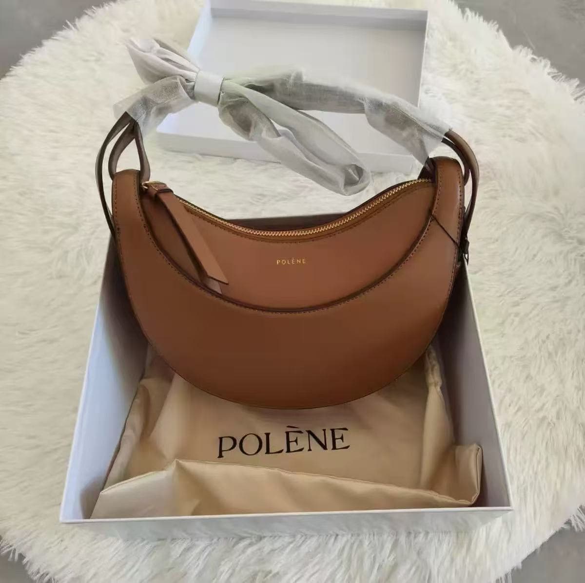 Cowhide polene crescent bag 2026 new bag genuine leather French niche design single room armpit bag crossbody bag