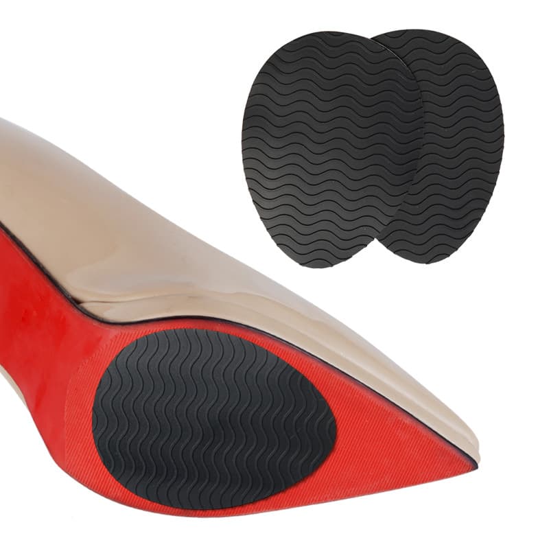 Water-wave patterned self-adhesive anti-slip pads for high heels, offering noise reduction, wear resistance, and shock absorption.