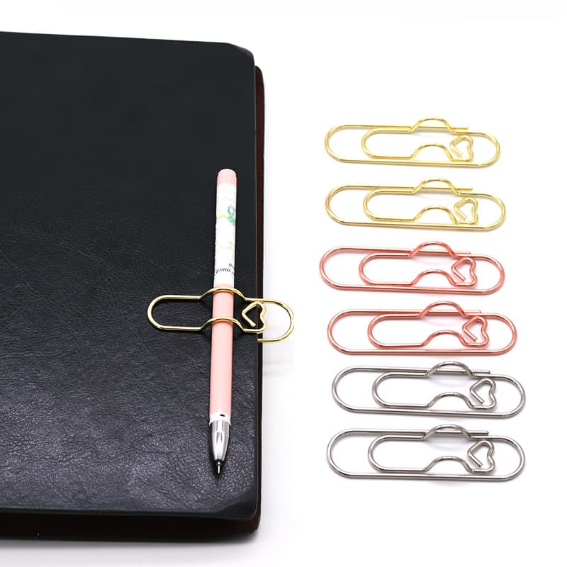 Manufacturer of creative gold-colored metal heart-shaped pen clips and accessories, wholesale, free shipping, portable pencil holders.