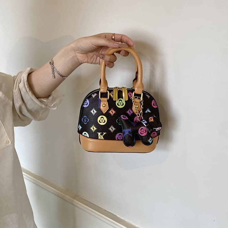 Wholesale cross-border printed small shell handbag leather fabric mobile phone bag coin key bag children's crossbody bag