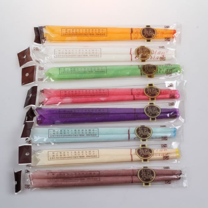 Wholesale aromatherapy flared ear candles, 8 scents and colors with stoppers, Native American bag ear candles, bulk pricing.