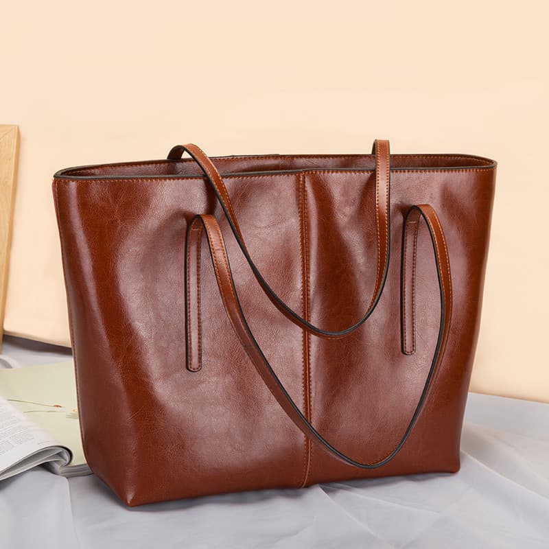 Guangzhou Women's Bag 2026 New Large Bag Women's Fashion Shoulder Bag Commuter Tote Bag Cowhide Handbag Large Capacity Women's Bag