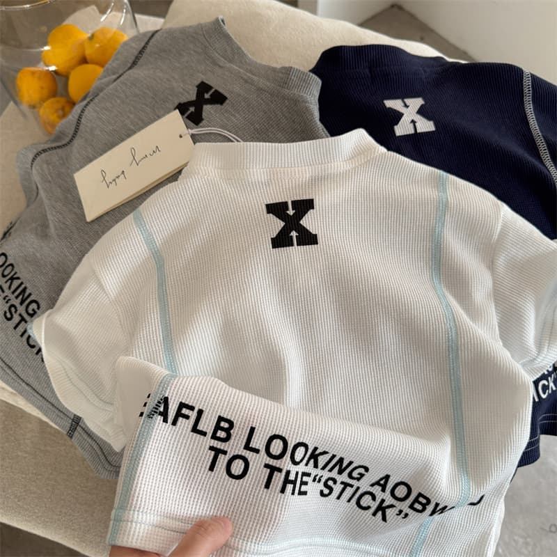 Children's Polo Shirt 2026 Squinty Eyes Summer New Arrival Boys and Girls Printed Pocket Polo Shirt Baby V-Neck Short Sleeve T-Shirt