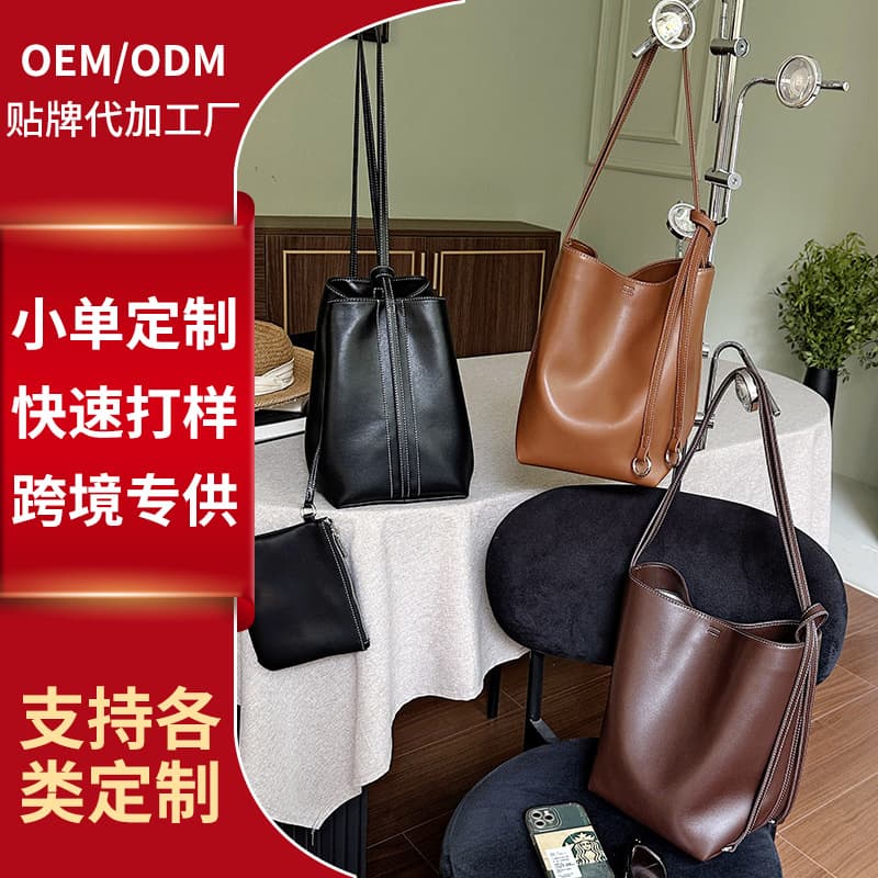 Tote bag, genuine leather, large capacity, retro commuter bucket bag, women's 2025 new autumn and winter light luxury niche shoulder bag.
